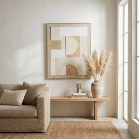 Lumera Japandi framed abstract canvas wall art displayed above a wooden console table in a neutral living room.