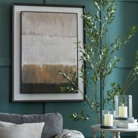 Moderno extra large linen canvas wall art displayed above a sofa, featuring neutral cream, grey and earthy brown abstract blocks in a dark framed setting.