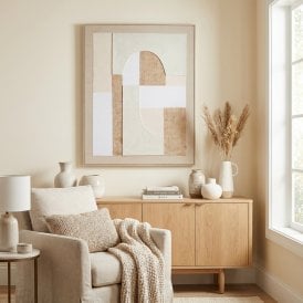 Portina Japandi framed abstract canvas wall art displayed above a light wood sideboard in a neutral living room.
