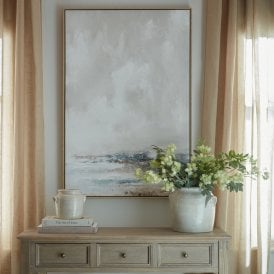 Veydra hand-painted framed canvas wall art displayed above a wooden console table in a neutral interior.